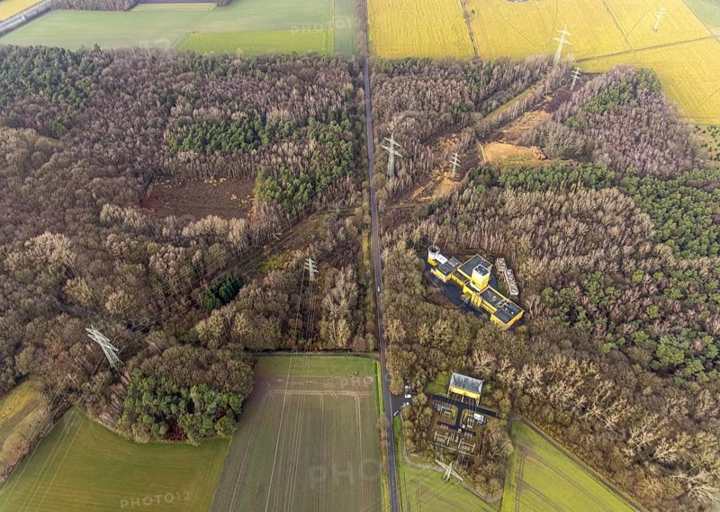 Aerial view of Ost Schacht Sandbochum mine in a forest area, steag substation Sandbochum, Kerstheider Straße in Hamm, Ruhr area, North Rhine-Westphalia, Germany, Ost colliery, DE, Europe, Hamm, Heinrich Robert Schacht Sandbochum, aerial view, aerial photography, aerial photography, aerial photography, Rhine-Ruhr metropolitan region, overview, substation, bird's eye view, forest area, birds-eyes view, former Ost colliery, overview