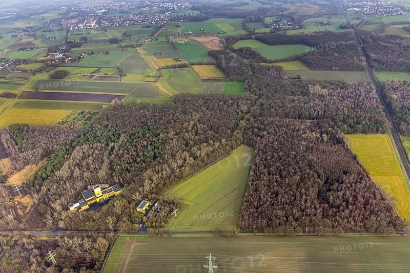 Aerial view of Ost Schacht Sandbochum mine in a forest area, steag substation Sandbochum, Kerstheider Straße in Hamm, Ruhr area, North Rhine-Westphalia, Germany, Ost colliery, DE, Europe, Hamm, Heinrich Robert Schacht Sandbochum, aerial view, aerial photography, aerial photography, aerial photography, Rhine-Ruhr metropolitan region, overview, substation, bird's eye view, forest area, birds-eyes view, former Ost colliery, overview