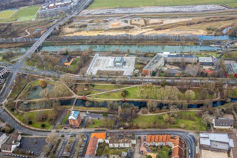 Aerial view construction area new water sports centre on Adenauerallee at Hammonense grammar school with transition to Nordring and Hans-Böckler-Platz in Hamm, Ruhr area, North Rhine-Westphalia, Germany, construction work, construction vehicles, construction area, construction site, building plots, construction crane, construction measure, construction project, construction site, education, educational institution, DE, Datteln-Hamm Canal, development, Europe, river Lippe, business park, grammar school, Hamm, industrial area, canal edge, educational institute, aerial view, aerial photograph, aerial photography, aerial photography, Rhine-Ruhr metropolitan region, new building, shipping, school, overview, bird's-eye view, overview