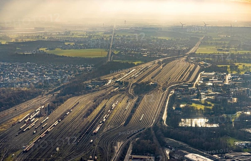 Aerial view shunting yard and freight yard in backlight in Hamm, Ruhr area, North Rhine-Westphalia, Germany, railway tracks, railway station, DE, Deutsche Bahn AG, Europe, backlight, railway tracks, Hamm, aerial view, aerial photograph, aerial photography, aerial photography, Rhine-Ruhr metropolitan region, overview, bird's eye view, birds-eyes view, former signal box, overview