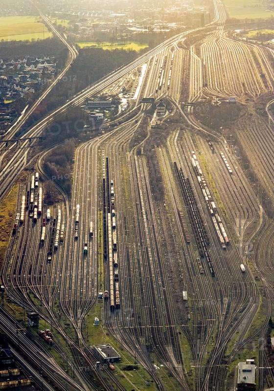 Aerial view shunting yard and freight yard in backlight in Hamm, Ruhr area, North Rhine-Westphalia, Germany, railway tracks, railway station, DE, Deutsche Bahn AG, Europe, backlight, railway tracks, Hamm, aerial view, aerial photograph, aerial photography, aerial photography, Rhine-Ruhr metropolitan region, overview, bird's eye view, birds-eyes view, former signal box, overview