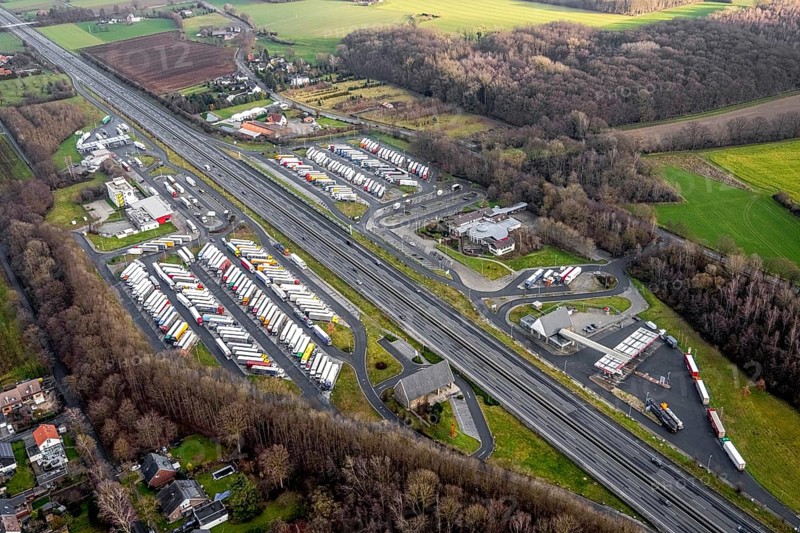 Aerial view motorway service area Rhynern-Nord and Rhynern-Süd on the A2 motorway, truck parking, Hamm, Ruhr area, North Rhine-Westphalia, Germany, A2 motorway, DE, Europe, shapes and colours, freight traffic, logistics, aerial view, aerial photograph, aerial photography, aerial photography, Rhine-Ruhr metropolitan region, parking spaces, service area, service area, transport, overview, bird's-eye view, bird's-eye view, overview
