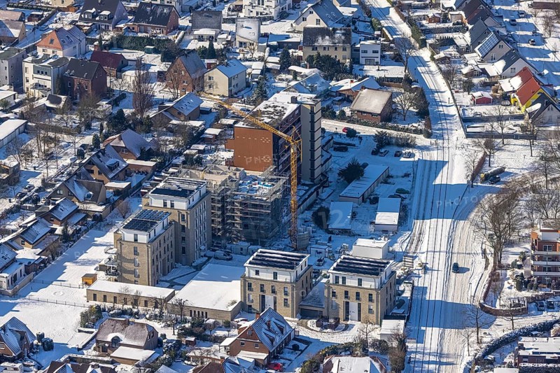 Aerial view, construction site, new building, Augenweide residential complex, condominiums and penthouses, winter, snow-covered streets and roofs, Grenzweg, Uentrop, Hamm, Ruhr area, North Rhine-Westphalia, Germany, DE, Europe, aerial view, aerial photography, aerial photography, snow, overview, bird's-eye view, view, overview, new building, residential complex, living, flat, houses, residential buildings, housing estate, settlement