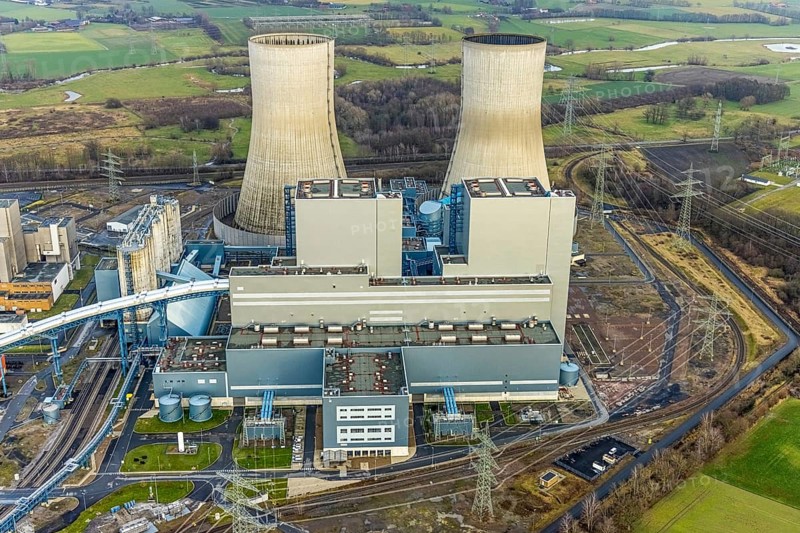 Aerial view of the RWE Westfalen power plant in Uentrop in Hamm, Ruhr area, North Rhine-Westphalia, Germany, DE, Europe, distant view, shapes and colours, Hamm, coal-fired power plant, cooling towers, aerial view, aerial photograph, aerial photography, aerial photography, Rhine-Ruhr metropolitan region, tower, overview, bird's-eye view, twin towers, birds-eyes view, overview