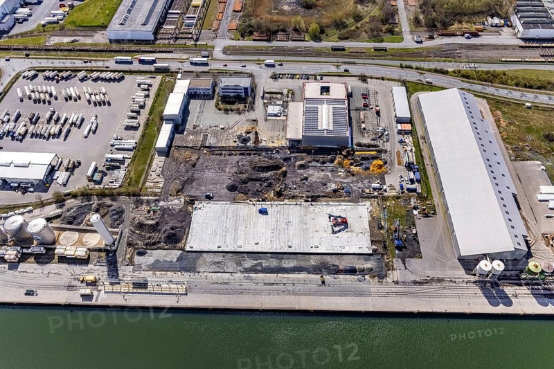 Aerial view, industrial estate harbour, construction site Lanfer site, loading terminal, Datteln-Hamm canal, Herringen, Hamm, Ruhr area, North Rhine-Westphalia, Germany, construction work, construction area, building site, building plots, construction project, construction site, DE, Europe, commercial area, industrial estate, industrial park, commercial use, industrial facilities, industrial area, industrial site, canal, Lanfer Logistik, aerial photograph, aerial photography, aerial photography, production plants, production halls, overview, bird's eye view, birds-eyes view, overview