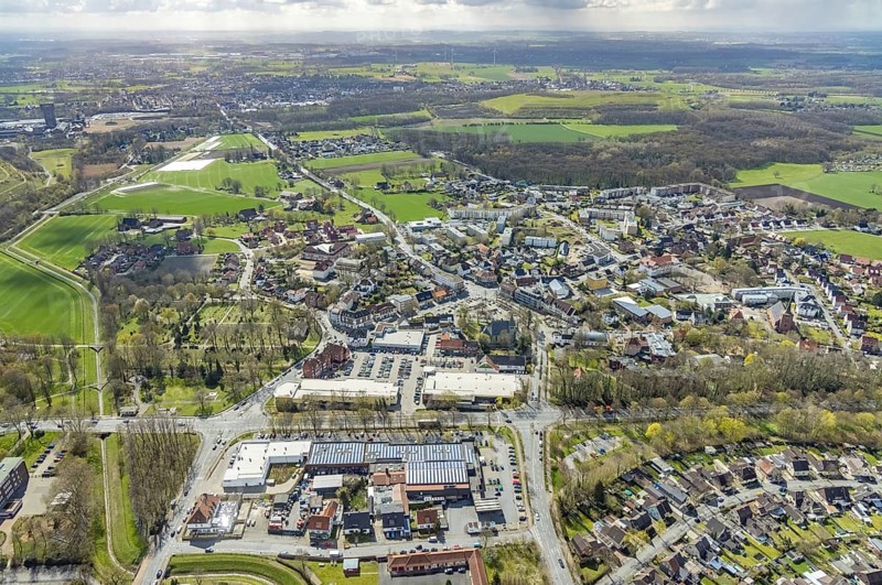 Aerial view, Lippecarree shopping centre at Herringer Markt, Evangelical St. Victor Church, Herringen, Hamm, Ruhr area, North Rhine-Westphalia, Germany, place of worship, DE, shopping centre, shopping place, shopping mall, Europe, religious community, place of worship, holy place, church, church community, denomination, aerial view, aerial photography, aerial photography, local supply centre, religion, religious site, shopping centre, overview, bird's-eye view, overview
