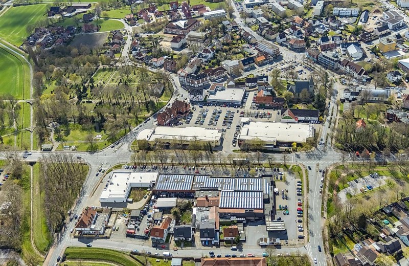 Aerial view, Lippecarree shopping centre at Herringer Markt, Evangelical St. Victor Church, Herringen, Hamm, Ruhr area, North Rhine-Westphalia, Germany, place of worship, DE, shopping centre, shopping place, shopping mall, Europe, religious community, place of worship, holy place, church, church community, denomination, aerial view, aerial photography, aerial photography, local supply centre, religion, religious site, shopping centre, overview, bird's-eye view, overview