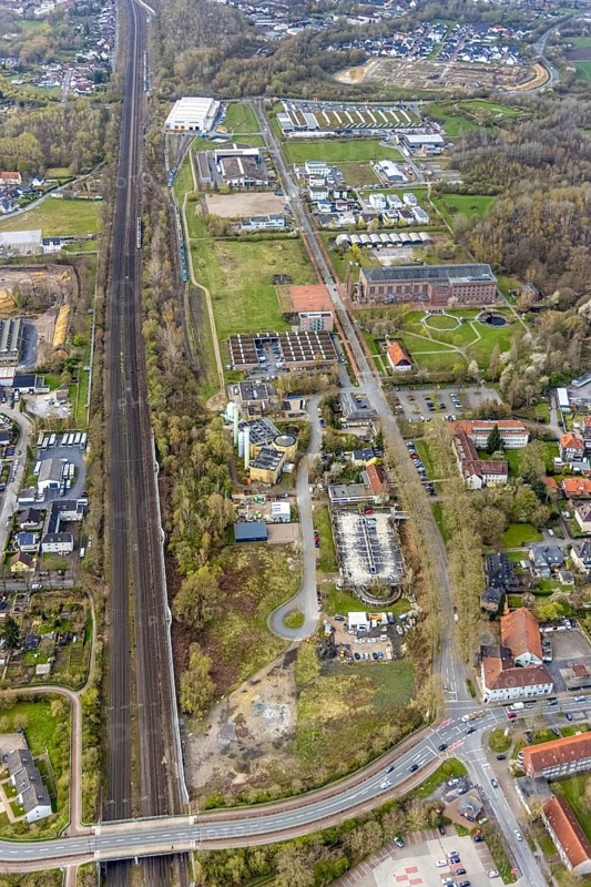 Aerial view, commercial area Ökozentrum Sachsenweg, Alfred-fisherman-Halle in Heessen, Hamm, Ruhr area, North Rhine-Westphalia, Germany, railway tracks, DE, Europe, commercial enterprises, commercial area, commercial park, commercial location, commercial use, industrial area, industrial building, industrial culture, industrial site, Keolis Deutschland GmbH, aerial view, aerial photography, aerial photography, SMT Scharf AG, Sondermann-Brot Bäckerei, overview, event location, event venue, event centre, bird's-eye view, forest area, birds-eyes view, overview, Öko-Zentrum North Rhine-Westphalia