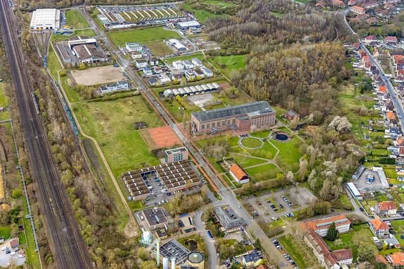 Aerial view, commercial area Ökozentrum Sachsenweg, Alfred-fisherman-Halle in Heessen, Hamm, Ruhr area, North Rhine-Westphalia, Germany, railway tracks, DE, Europe, commercial enterprises, commercial area, commercial park, commercial location, commercial use, industrial area, industrial building, industrial culture, industrial site, Keolis Deutschland GmbH, aerial view, aerial photography, aerial photography, SMT Scharf AG, Sondermann-Brot Bäckerei, overview, event location, event venue, event centre, bird's-eye view, forest area, birds-eyes view, overview, Öko-Zentrum North Rhine-Westphalia