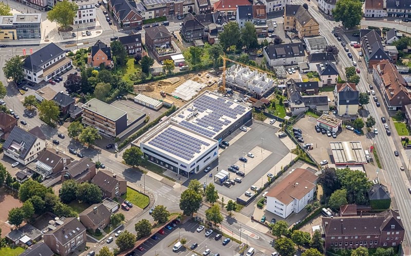 Aerial view, ALDI Nord supermarket with solar roof and construction area Heessener Gärten in Heessen, Hamm, Ruhr area, North Rhine-Westphalia, Germany, construction work, construction area, building site, building plots, construction project, construction site, DE, Europe, aerial view, aerial photography, aerial photography, new construction, photovoltaic, photovoltaic system, solar, solar system, solar roof, solar energy, overview, bird's eye view, birds-eyes view, overview