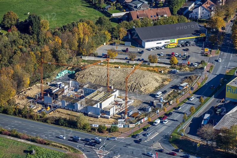 Aerial view, construction area and new building for Mensing Galerie corner Werler Straße and Unnaer Straße and in the district Rhynern in Hamm, Ruhr area, North Rhine-Westphalia, Germany, construction work, construction area, building site, building plots, construction project, construction site, DE, Europe, gallery, commercial enterprises, commercial area, commercial area, commercial location, commercial use, Hamm, culture, art, aerial view, aerial photography, aerial photography, new building, overview, bird's eye view, birds-eyes view, overview