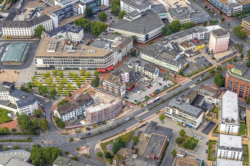 Aerial view, city centre view city with Platz der Deutschen Einheit at Hamm main station as well as construction site and new residential building on the former site of the Kippâ'¬â¢n in Bahnhofstraße in Mitte, Hamm, Ruhr area, North Rhine-Westphalia, Germany, Bahnhofstraße, construction work, construction area, construction site, building plots, construction project, construction site, bunker, DE, Europe, commercial buildings, high bunker, aerial view, aerial photography, aerial photography, new construction, square, overview, bird's-eye view, overview, city centre view City with Platz der Deutschen Einheit at Hamm main station as well as construction site and new residential building on the former site of the Kipp'™n in Bahnhofstraße in Mitte