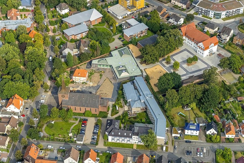 Aerial view, catholic Heilig Kreuz church and Caritas retirement home St. Josef in the district of Herringen in Hamm, Ruhr area, North Rhine-Westphalia, Germany, old people's home, retirement home, old people's home, place of worship, care and nursing, DE, Europe, religious community, place of worship, Hamm, holy place, church, parish, denomination, aerial view, aerial photography, aerial photography, care facility, religion, religious site, retirement home, retirement residence, retirement home, retirement centre, overview, bird's eye view, birds-eyes view, overview
