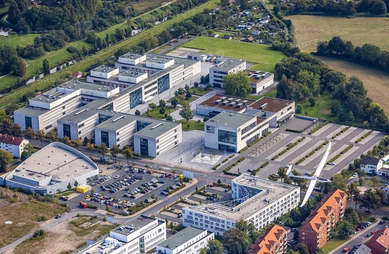 Aerial view, Hamm-Lippstadt University of Applied Sciences and the construction site at SCI:Q Science Quarter with the Duo Discus high-performance double-seater D-4199 in the Mitte district of Hamm, Ruhr area, North Rhine-Westphalia, Germany, construction work, construction, construction area, building site, building plots, construction project, construction site, education, educational institution, DE, Europe, aircraft, business park, property tax, Hamm, real estate, industrial area, aerial photography, aerial photography, aerial photography, Marker Allee, Rhine-Ruhr metropolitan region, new build, Paracelsuspark, Science Quarter Hamm, sailor, tech park, overview, university, bird's-eye view, science quarter, residential complex, living and living, residential area, residential buildings, residential quality, residential neighbourhood, housing estate, birds-eyes view, overview