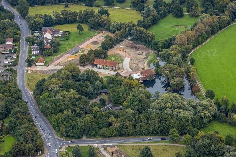 Aerial view, construction site and renovation of the Schlossmühle am Mühlengraben am Mühlenteich in the district Heessen in Hamm, Ruhr area, North Rhine-Westphalia, Germany, construction work, construction area, building site, building plots, construction project, construction site, DE, Europe, Hamm, aerial view, aerial photography, aerial photography, aerial photography, renovation, overview, bird's-eye view, overview
