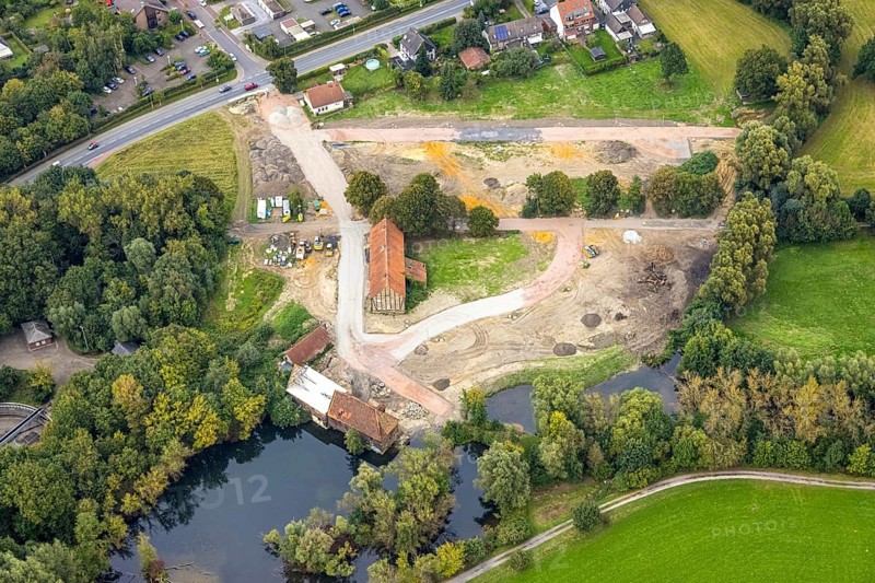 Aerial view, construction site and renovation of the Schlossmühle am Mühlengraben am Mühlenteich in the district Heessen in Hamm, Ruhr area, North Rhine-Westphalia, Germany, construction work, construction area, building site, building plots, construction project, construction site, DE, Europe, Hamm, aerial view, aerial photography, aerial photography, aerial photography, renovation, overview, bird's-eye view, overview