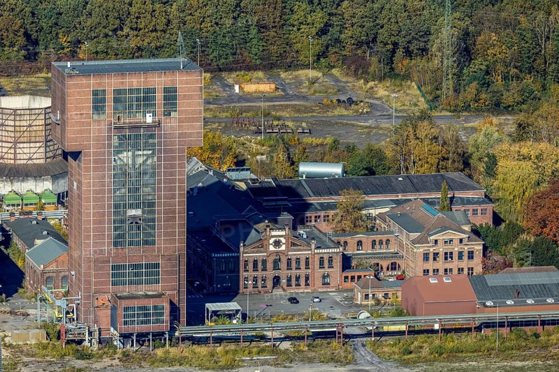 Aerial view, CreativRevier Hamm at the former Ost Zeche Heinrich Robert colliery with hammerhead tower in the Pelkum district of Hamm, Ruhr area, North Rhine-Westphalia, Germany, mine, Heinrich Robert colliery, DE, Europe, commercial enterprises, commercial area, commercial park, commercial location, commercial use, Hamm, industrial facilities, industrial area, industrial building, industrial site, aerial view, aerial photography, aerial photography, coal mine, tower, overview, bird's-eye view, birds-eyes view, former Ost colliery, historical, historical site, overview, destroyed building