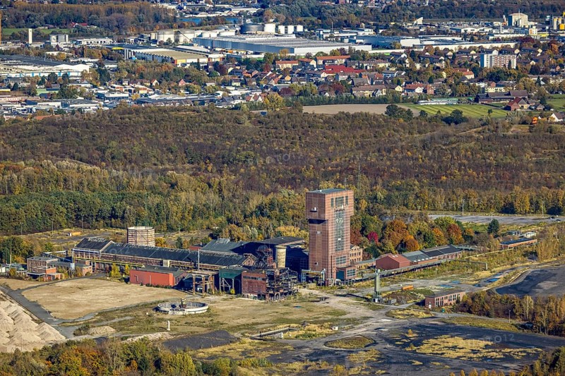 Aerial view, CreativRevier Hamm at the former Ost Zeche Heinrich Robert colliery with hammerhead tower in the Pelkum district of Hamm, Ruhr area, North Rhine-Westphalia, Germany, mine, Heinrich Robert colliery, DE, Europe, commercial enterprises, commercial area, commercial park, commercial location, commercial use, Hamm, industrial facilities, industrial area, industrial building, industrial site, aerial view, aerial photography, aerial photography, coal mine, tower, overview, bird's-eye view, birds-eyes view, former Ost colliery, historical, historical site, overview, destroyed building