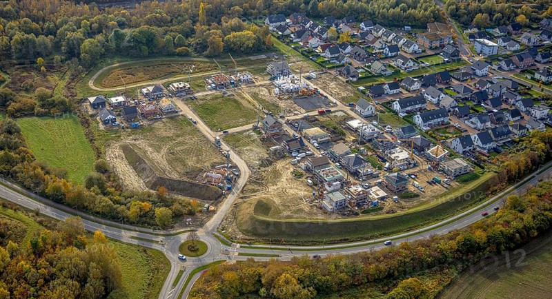 Aerial view, construction area Heimshof Ost at Sachsenring in the district Heessen in Hamm, Ruhr area, North Rhine-Westphalia, Germany, construction work, construction, construction area, construction site, building plots, construction project, construction site, DE, Europe, property tax, Hamm, real estate, roundabout, roundabout, aerial view, aerial photography, aerial photography, new construction, overview, bird's eye view, residential complex, living and living, residential area, residential buildings, residential quality, residential neighbourhood, residential estate, birds-eyes view, overview