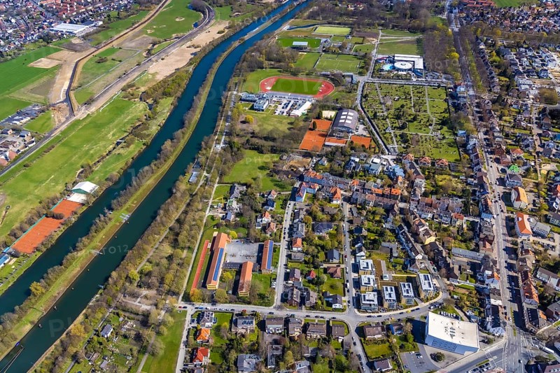 Aerial view, Maximare Erlebnistherme Bad Hamm, Sports Centre Hamm-Ost with Jahnstadion, Theodor-Heuss-School, Municipal Music School Hamm, River Lippe and Datteln-Hamm Canal, Centre, Hamm, Ruhr Area, North Rhine-Westphalia, Germany, Arthur-Dewitz-Straße, Burial site, Care and nursing, Education, Educational institution, DE, Adventure pool, Europe, Cemetery, Football pitch, Football stadium, Healthcare, Gottesacker, graves, cemetery, teaching institute, aerial view, aerial photography, aerial photography, medical facility, medical aid, eastern cemetery, care facility, rehabilitation centre, resting place, school, sport, sports facilities, sports field, sports facility, tennis, tennis facility, tennis courts, overview, bird's-eye view, overview, reha Bad Hamm, medical care