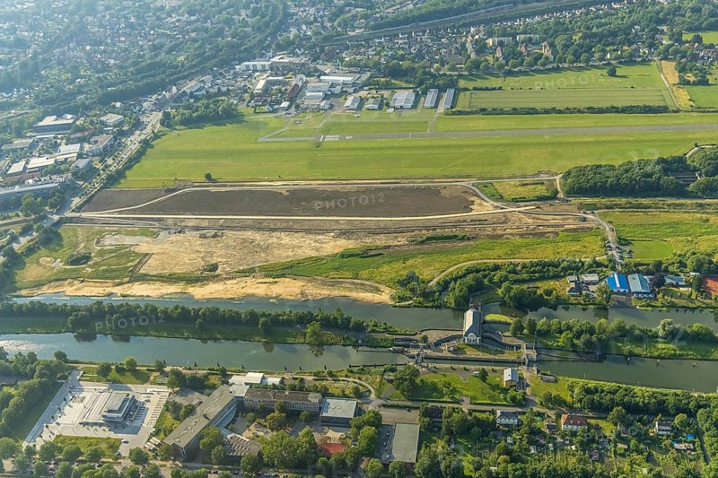 Aerial photo, Gymnasium Hammonense, new water sports centre, construction site Lippe reconstruction protective dam at Jupp-Eickhoff-Weg, Lippe beach, Hamm-Lippewiesen airfield, Heessen, Hamm, Ruhr area, North Rhine-Westphalia, Germany, construction work, construction area, construction site, building plots, construction, construction project, construction site, education, educational institution, DE, Europe, flight mission, airport, airfield, grammar school, runway, educational institute, aerial photography, aerial photography, aerial photography, school, runway, overview, bird's-eye view, birds-eyes view, overview
