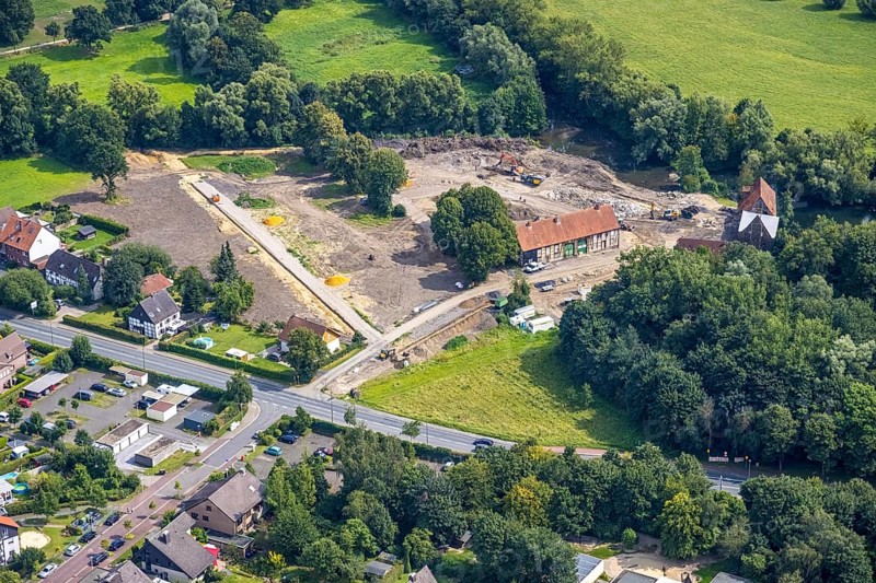 Aerial view, construction site and renovation of the Schlossmühle am Mühlengraben am Mühlenteich in the district of Heessen, Hamm, Ruhr area, North Rhine-Westphalia, Germany, construction work, construction area, building site, building plots, construction project, construction site, DE, Europe, aerial view, aerial photography, aerial photography, aerial photography, renovation, overview, bird's-eye view, overview