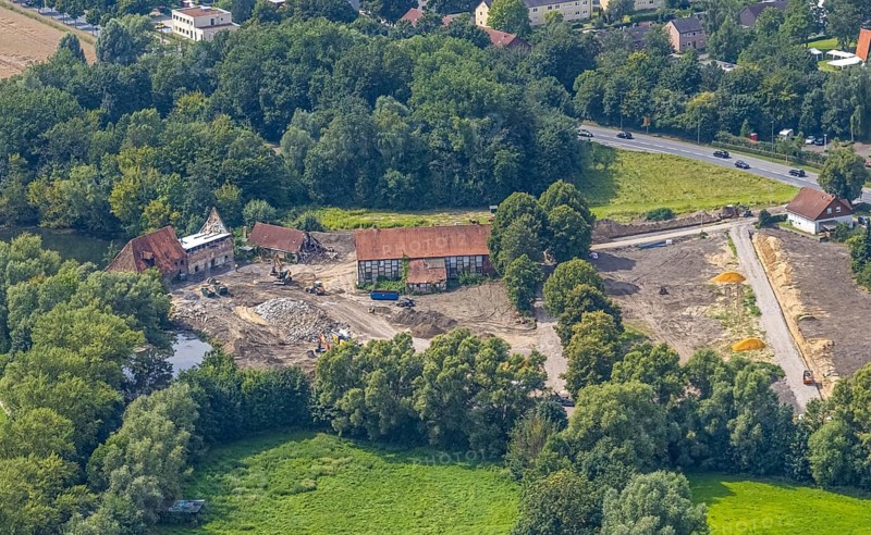 Aerial view, construction site and renovation of the Schlossmühle am Mühlengraben am Mühlenteich in the district of Heessen, Hamm, Ruhr area, North Rhine-Westphalia, Germany, construction work, construction area, building site, building plots, construction project, construction site, DE, Europe, aerial view, aerial photography, aerial photography, aerial photography, renovation, overview, bird's-eye view, overview