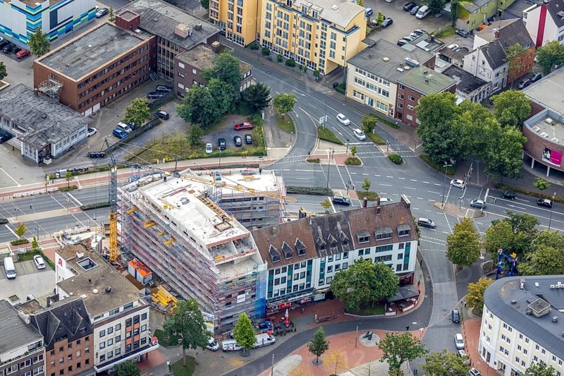 Aerial view, City Neue Bahnhofstraße corner Friedrichstraße with construction site and new residential building on the former site of the Kippââ'¬â¢n in the district Mitte in Hamm, Ruhr area, North Rhine-Westphalia, Germany, construction work, construction area, construction site, building plots, construction project, construction site, DE, Europe, property tax, Hamm, real estate, aerial view, aerial photography, aerial photography, new construction, overview, bird's eye view, residential complex, living and living, residential buildings, birds-eyes view, overview, City Neue Bahnhofstraße corner Friedrichstraße with construction site and new residential building on the former site of the Kipp'™n in the Mitte district in Hamm