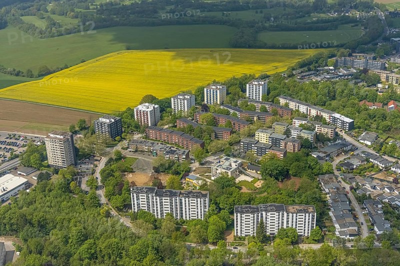 Aerial view, residential area and high-rise buildings Rhönstraße, district and development centre Oberilp, Heiligenhaus, Ruhr area, North Rhine-Westphalia, Germany, DE, Europe, property tax, high-rise buildings, real estate, aerial view, aerial photography, aerial photography, photovoltaics, photovoltaic system, rape field, solar, solar system, solar energy, solar energy, overview, bird's-eye view, residential complex, living and life, residential area, residential buildings, residential quality, residential quarter, housing estate, birds-eyes view, overview