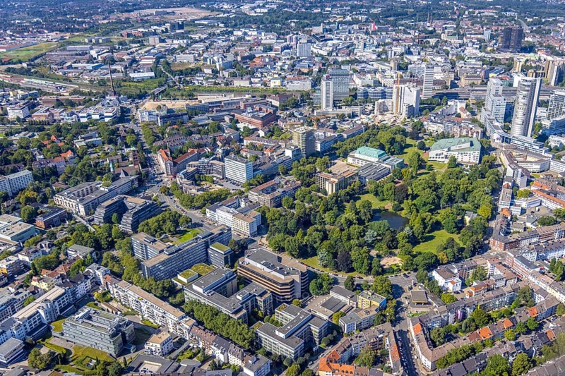 Aerial view, city centre view Essen with demolition Ypsilon-Haus of RWE headquarters Essen and city garden with Philharmonie Essen in the southern district in Essen, Ruhr area, North Rhine-Westphalia, Germany, City, DE, Essen, Europe, property tax, real estate, city centre, aerial view, aerial photography, aerial photography, townscape, city area, city centre, overview, bird's eye view, woodland, residential area, living and life, residential area, residential buildings, residential quality, housing estate, birds-eyes view, overview