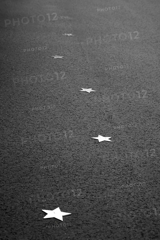 Stars on sidewalk as memorial for Nazi victims, Tilbeck Abbey, Tilbeck foundation, Havixbeck, Muensterland, North Rhine-Westphalia, Germany