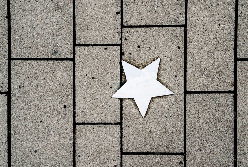 Stars on sidewalk as memorial for Nazi victims, Tilbeck Abbey, Tilbeck foundation, Havixbeck, Muensterland, North Rhine-Westphalia, Germany