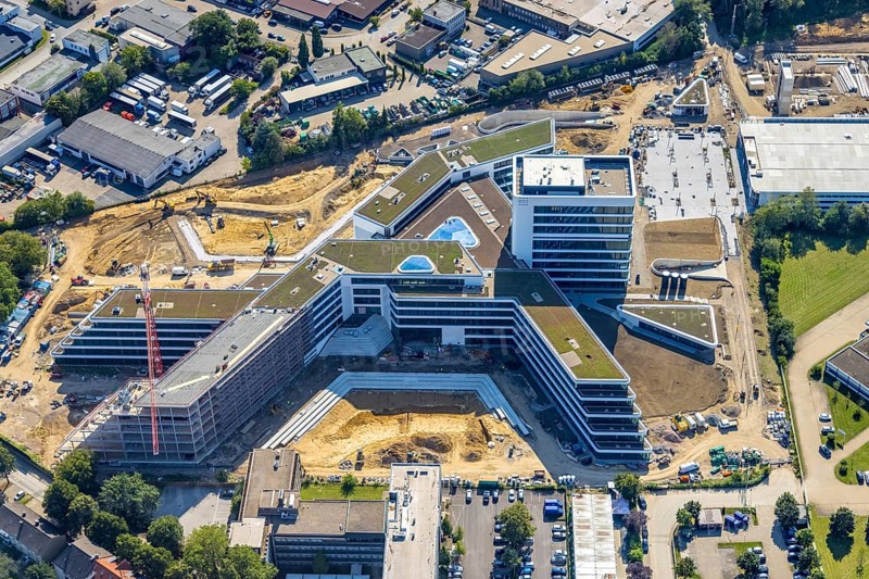 Aerial view, construction site and new construction ALDI-Nord Campus on the A40 motorway, Am Luftschacht in Essen-Kray in Essen, Ruhr area, North Rhine-Westphalia, Germany, construction work, construction area, building site, building plots, construction crane, construction project, construction site, DE, development, Essen, Europe, commercial enterprises, commercial area, commercial park, commercial site, commercial use, industrial site, capacity requirement, aerial view, aerial photography, aerial photography, new construction, overview, bird's-eye view, overview