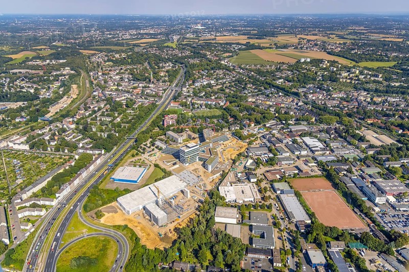Aerial view, construction site and new construction ALDI-Nord Campus on the A40 motorway, Am Luftschacht in Essen-Kray in Essen, Ruhr area, North Rhine-Westphalia, Germany, construction work, construction area, building site, building plots, construction crane, construction measure, construction project, construction site, Buderus branch Essen - Bosch Thermotechnik, DE, development, Essen, Europe, commercial enterprises, commercial area, commercial park, commercial site, commercial use, industrial site, capacity requirement, aerial photograph, aerial photography, aerial photography, new construction, overview, bird's-eye view, birds-eyes view, overview