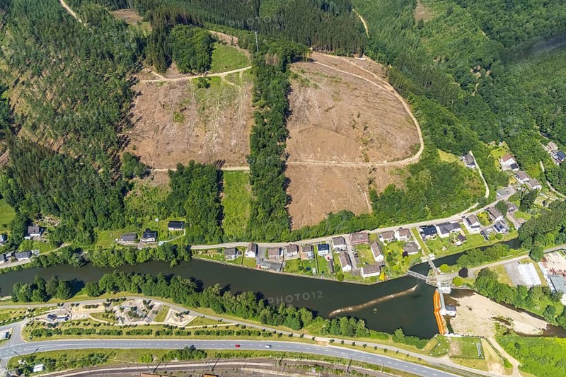 Aerial view, forest area and forest damage on Lennestraße at the historic Lennewehr, Finnentrop, Sauerland, North Rhine-Westphalia, Germany, tree death, bark beetle damage, bark beetle plague, DE, Europe, property tax, real estate, clear-cutting, aerial photograph, aerial photography, aerial photography, overview, bird's-eye view, forest, forest damage, forest dieback, residential area, living and living, residential area, residential buildings, residential quality, residential estate, birds-eyes view, overview