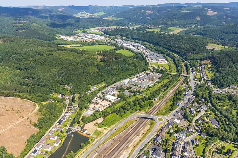 Aerial view, railway tracks Am Bahnhof Finnentrop, industrial area Industriestraße, Finnentrop, Sauerland, North Rhine-Westphalia, Germany, railway tracks, DE, Deutsche Bahn AG, Europe, commercial enterprises, commercial area, commercial location, commercial use, railway tracks, industrial area, industrial building, industrial location, roundabout, roundabout, aerial view, aerial photography, aerial photography, overview, bird's-eye view, overview