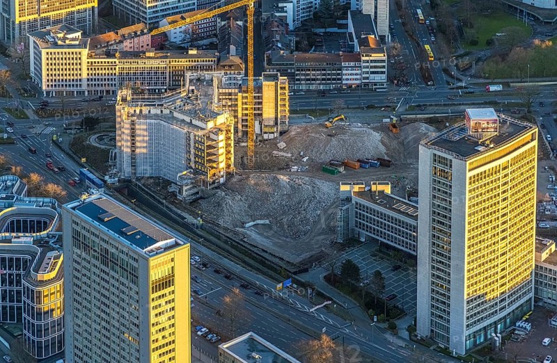Aerial view, demolition Ypsilon-Haus of the RWE headquarters Essen in the Huyssenallee, planned new building for office campus, in the evening light in the southern district in Essen, Ruhr area, North Rhine-Westphalia, Germany, evening light, demolition work, construction work, construction area, construction site, building plots, building project, building site, office buildings, office complex, DE, energy company, Essen, Europe, commercial buildings, aerial view, aerial photography, aerial photography, overview, bird's eye view, Ypsilon-Haus, birds-eyes view, overview