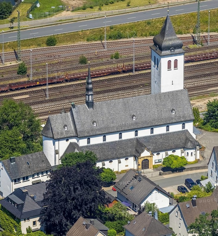 Aerial view, Catholic parish church St. Johannes Nepomuk, Finnentrop, Sauerland, North Rhine-Westphalia, Germany, place of worship, railway tracks, DE, Europe, religious community, place of worship, church, parish, denomination, aerial view, aerial photography, aerial photography, overview, bird's-eye view, overview