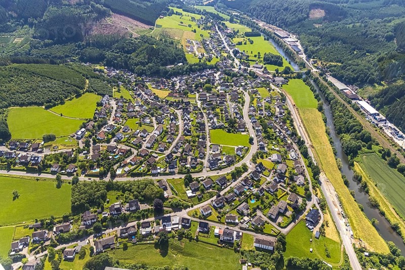 Aerial view, commercial area Bahnhofstraße at the edge of the forest on the Lenne and view of Rönkhausen, Finnentrop, Sauerland, North Rhine-Westphalia, Germany, DE, Europe, commercial enterprises, commercial area, commercial park, commercial location, commercial use, property tax, real estate, industrial area, industrial building, industrial location, aerial photograph, aerial photography, aerial photography, overview, bird's-eye view, forest area, residential area, housing and living, residential area, residential buildings, residential quality, housing estate, bird's-eye view, overview