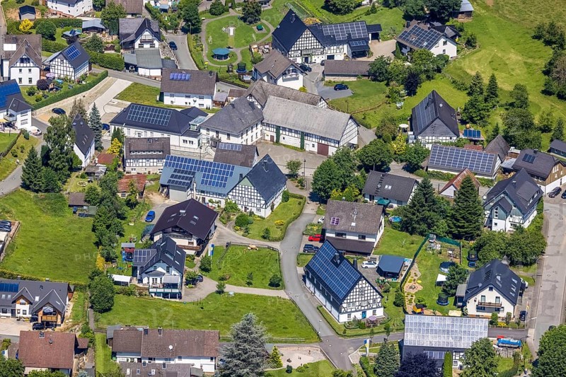 Aerial view, half-timbered houses with solar roof in the centre of Ostentrop, Finnentrop, Sauerland, North Rhine-Westphalia, Germany, DE, Europe, aerial view, aerial photography, aerial photography, photovoltaic, photovoltaic system, solar, solar system, solar roof, solar energy, solar energy, overview, bird's-eye view, overview