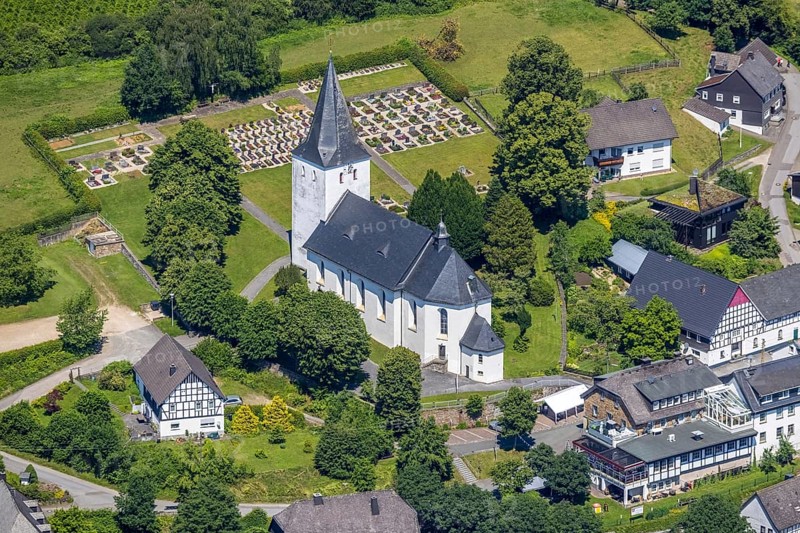 Aerial view, view of Schönholthausen, Kath. Pfarrkirche Mariä Himmelfahrt, Finnentrop, Sauerland, North Rhine-Westphalia, Germany, place of worship, burial place, DE, Europe, cemetery, memorial, religious community, place of worship, house of God, land tax, burial ground, holy place, real estate, church, parish, denomination, aerial view, aerial photography, aerial photography, religion, religious site, resting place, overview, bird's-eye view, housing estate, housing and living, residential area, residential buildings, housing quality, housing estate, birds-eyes view, overview