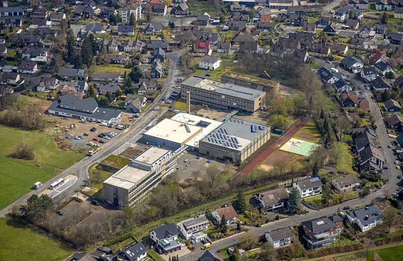 Construction site and new building Awo Mint-Kindergarten, Freudenberg Comprehensive School and Büschergrund Primary School, Büschergrund, Freudenberg, Sauerland, North Rhine-Westphalia, Germany, construction work, construction area, building site, building plots, construction project, building site, education, educational institution, Büschergrund school centre, DE, Europe, comprehensive school, primary school, Hermann-Vomhof-Straße, kindergarten, day care centre, day nursery, day care centre, educational institute, aerial view, aerial photograph, aerial photography, aerial photography, new building, OGS, school, overview, bird's eye view, birds-eyes view, overview