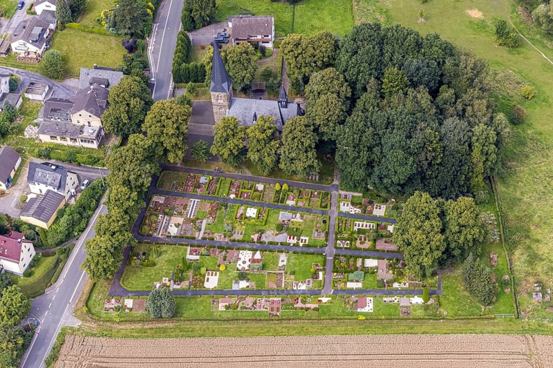 Aerial view, catholic church St. Agnes with cemetery in the district Bausenhagen, Fröndenberg/Ruhr, Ruhr area, North Rhine-Westphalia, Germany, place of worship, burial place, DE, Europe, cemetery, memorial, religious community, place of worship, house of God, graves, burial ground, holy place, church, parish, denomination, aerial view, aerial photography, aerial photography, religion, religious site, resting place, overview, bird's eye view, birds-eyes view, overview
