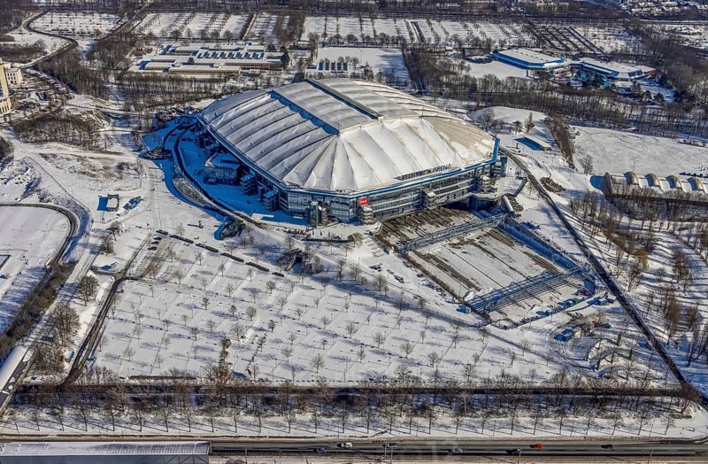 Aerial view, Schalke Veltins-Arena with closed roof and extension area for grass, Rudi-Assauer-Platz, Beckhausen, Gelsenkirchen, Ruhr area, North Rhine-Westphalia, Germany, Arena, Arena AufSchalke, Berger Feld, Bundesliga stadium, DE, Europe, FC Schalke 04, football pitch, football stadium, football club, aerial view, aerial photography, aerial photography, snow, sports, sports facilities, sports ground, sports venue, stadium, overview, bird's eye view, winter, birds-eyes view, closed roof of the arena, overview