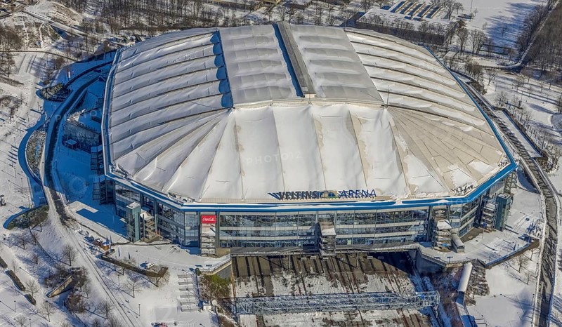 Aerial view, Schalke Veltins-Arena with closed roof and extension area for grass, Rudi-Assauer-Platz, Beckhausen, Gelsenkirchen, Ruhr area, North Rhine-Westphalia, Germany, Arena, Arena AufSchalke, Berger Feld, Bundesliga stadium, DE, Europe, FC Schalke 04, football pitch, football stadium, football club, aerial view, aerial photography, aerial photography, snow, sports, sports facilities, sports ground, sports venue, stadium, overview, bird's eye view, winter, birds-eyes view, closed roof of the arena, overview