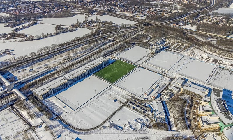 Aerial view, training ground in the snow at the Veltins-Arena, new car park Stan-Libuda-Weg, Erle, Gelsenkirchen, Ruhr area, North Rhine-Westphalia, Germany, Berger Feld, DE, Europe, FC Schalke 04, distant view, football pitch, football stadium, football club, hotel business, aerial view, aerial photography, aerial photography, snow, sports, sports facilities, sports field, sports facility, training grounds, overview, bird's eye view, winter, birds-eyes view, overview