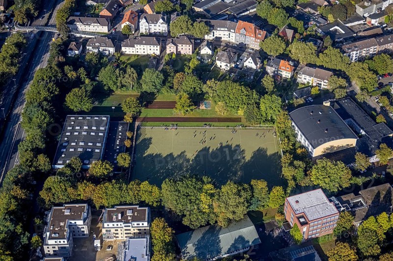 Aerial view, indoor swimming pool and sports hall as well as youths on the sports field at the Leibniz-Gymnasium in the district of Buer in Gelsenkirchen, Ruhr area, North Rhine-Westphalia, Germany, bathing establishment, bathing resort, DE, Europe, Gelsenkirchen, indoor swimming pool, aerial view, aerial photography, aerial photography, sports facilities, sports hall, sports field, sports facility, overview, bird's-eye view, overview