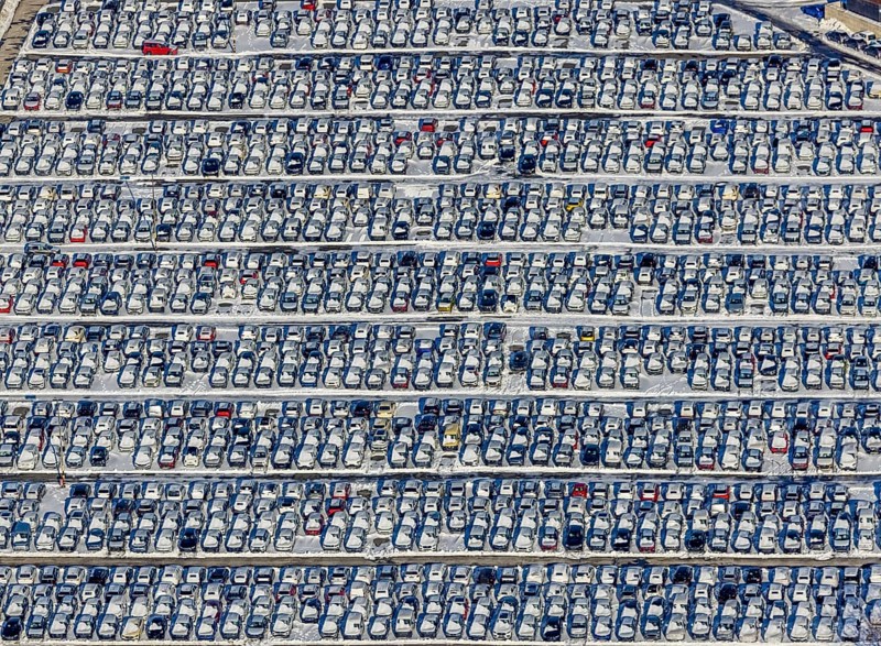 Aerial photo, CAT Automobillogistik Essen, Essen-Altenessen, Essen, Ruhr area, North Rhine-Westphalia, Germany, DE, Europe, shapes and colours, storage, logistics, logistics service, logistics service provider, logistics provider, aerial photo, aerial photography, aerial photography, snow, transport, transport service, overview, bird's eye view, winter, birds-eyes view, overview, car dump in winter, rows of cars, different coloured cars, car lot