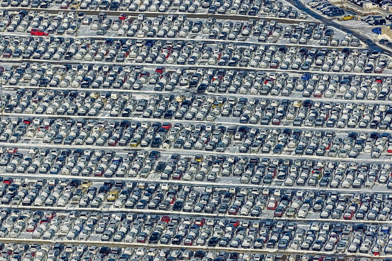 Aerial photo, CAT Automobillogistik Essen, Essen-Altenessen, Essen, Ruhr area, North Rhine-Westphalia, Germany, DE, Europe, shapes and colours, storage, logistics, logistics service, logistics service provider, logistics provider, aerial photo, aerial photography, aerial photography, snow, transport, transport service, overview, bird's eye view, winter, birds-eyes view, overview, car dump in winter, rows of cars, different coloured cars, car lot