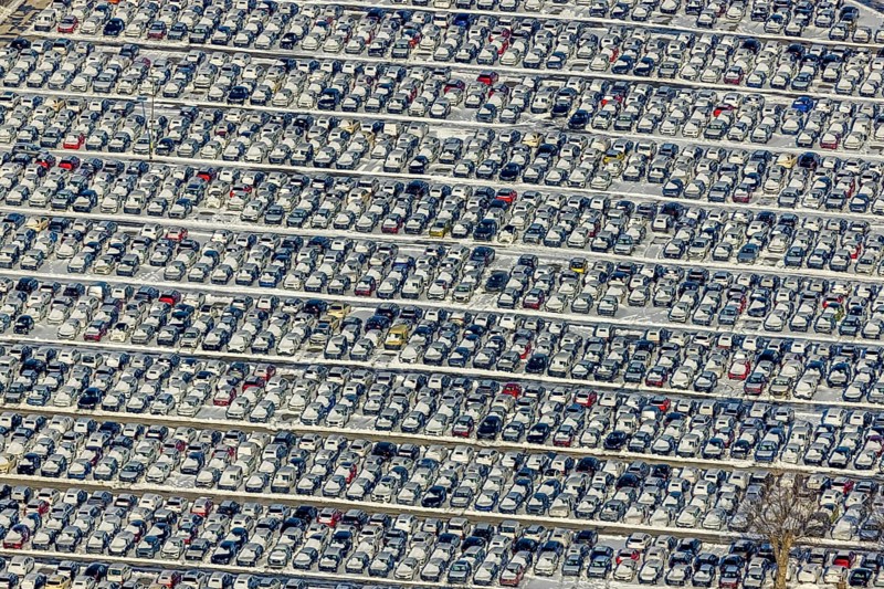 Aerial photo, CAT Automobillogistik Essen, Essen-Altenessen, Essen, Ruhr area, North Rhine-Westphalia, Germany, DE, Europe, shapes and colours, storage, logistics, logistics service, logistics service provider, logistics provider, aerial photo, aerial photography, aerial photography, snow, transport, transport service, overview, bird's eye view, winter, birds-eyes view, overview, car dump in winter, rows of cars, different coloured cars, car lot